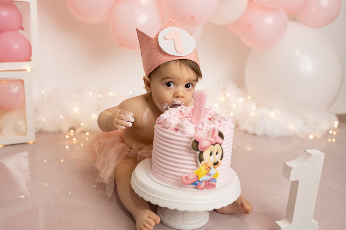 Reportaje de fotos mi primer cumpleaños con pastel de minnie mouse